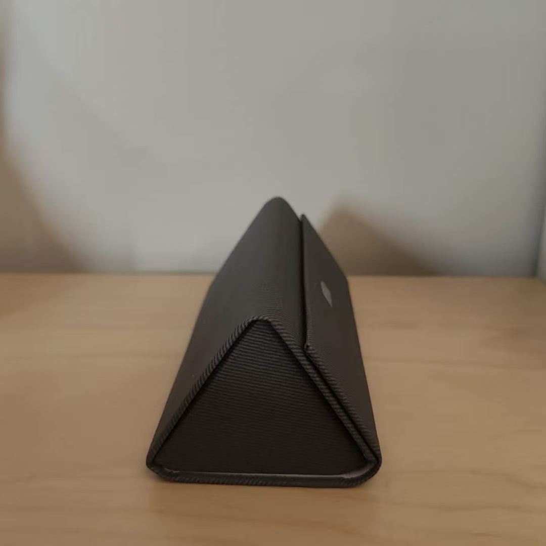 This is a glass case,It's the closest thing to a triangle in my house. I chose it because I don't have anything triangular at home. 